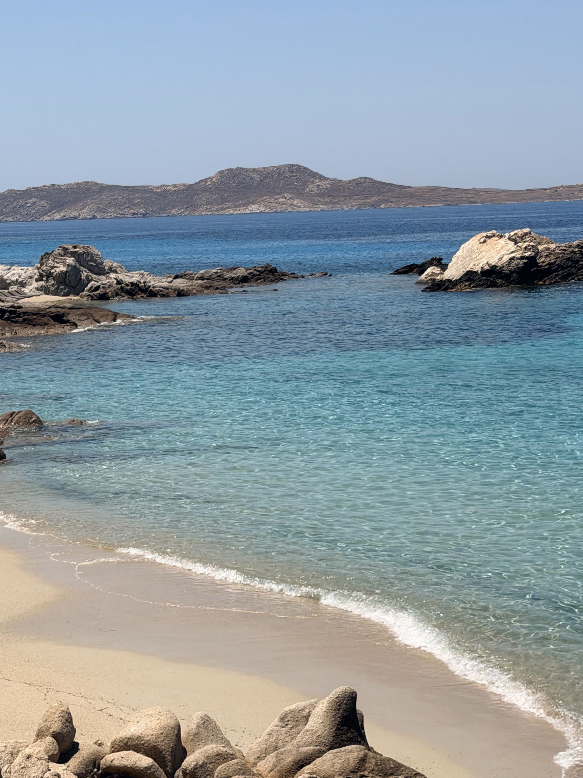 The sandy beach below the villa